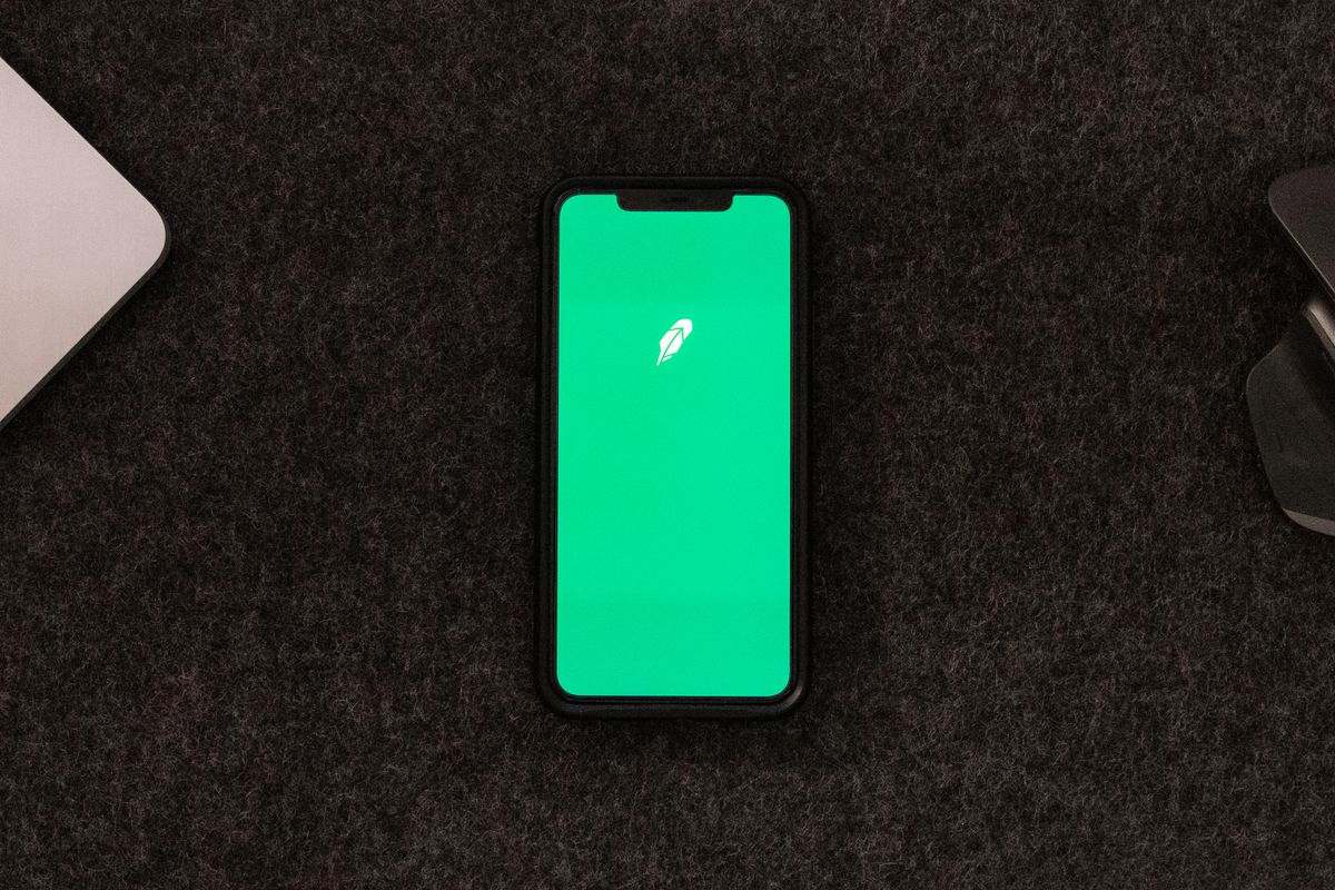 Smartphone displaying a sports betting app on a desk